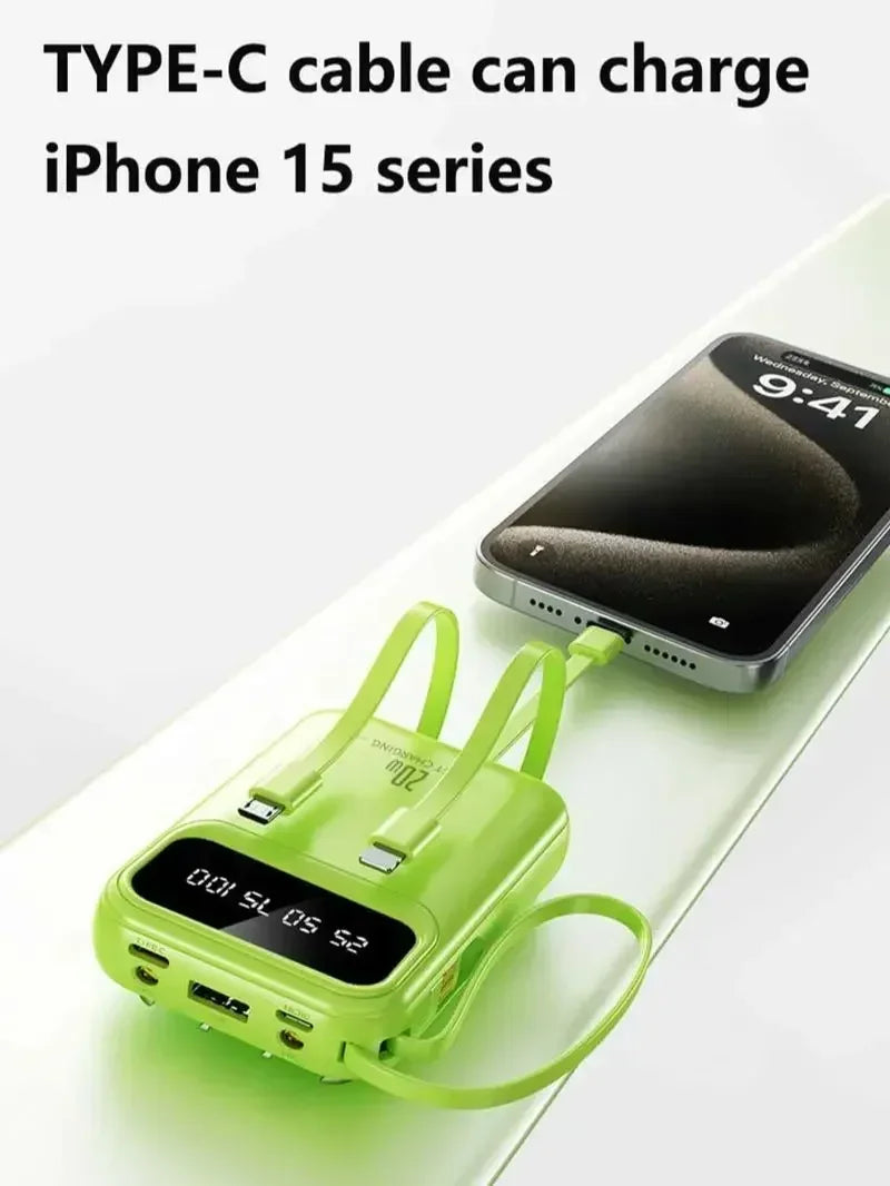 FanzyMarket 500000mAh portable power bank with 20W fast charge, built-in cables, LED light, and digital display in black.