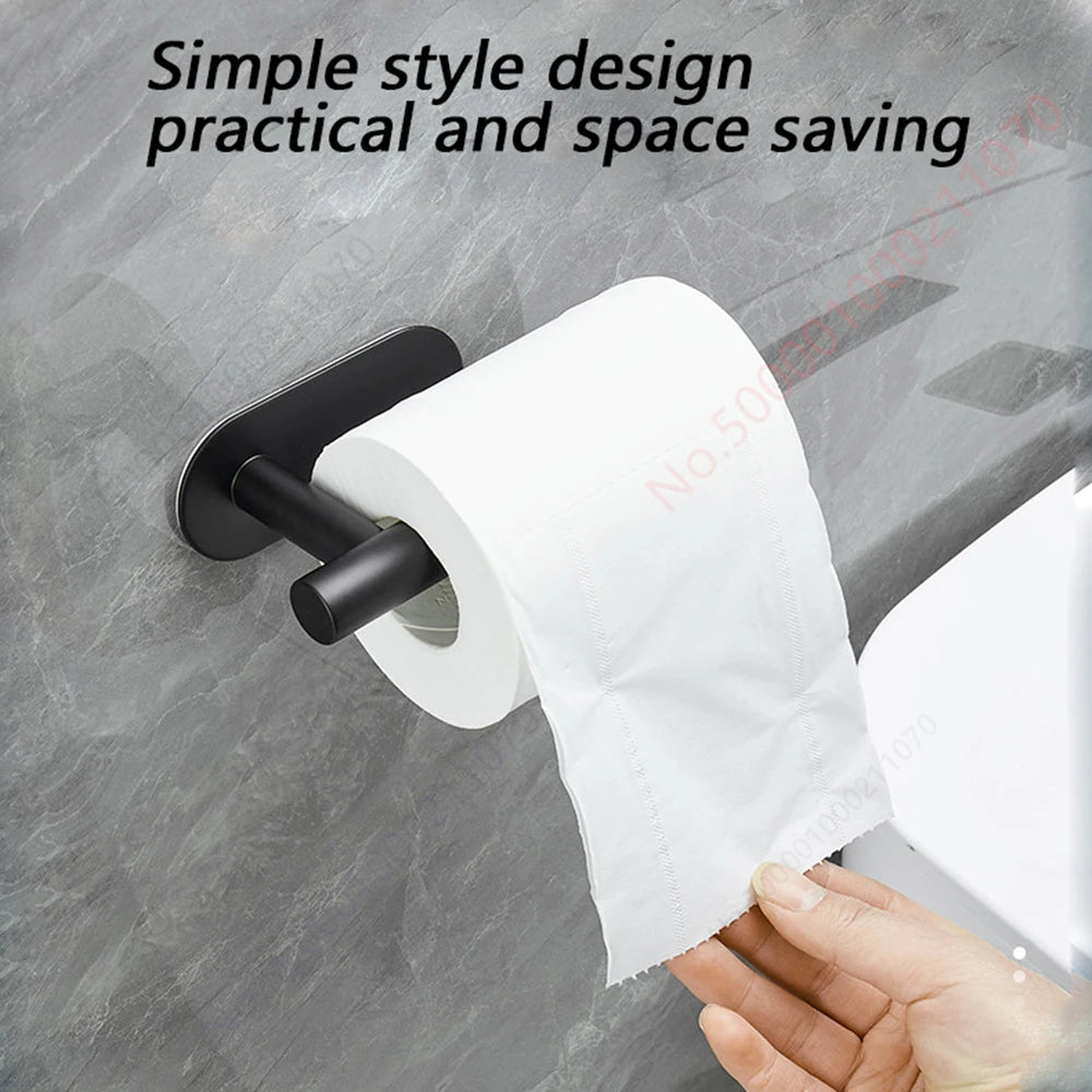 Two black stainless steel adhesive wall-mounted toilet paper holders from FanzyMarket, suitable for bathroom and kitchen use.