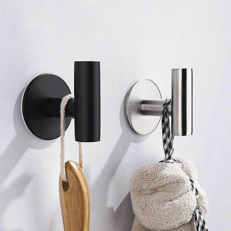 FanzyMarket stainless steel bathroom hardware set with towel rack, toilet paper holder, and hook in polished silver.