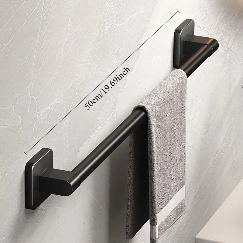 Six polished aluminum self-adhesive towel rack hooks from FanzyMarket, no-drill wall-mounted towel holder for bathroom use.