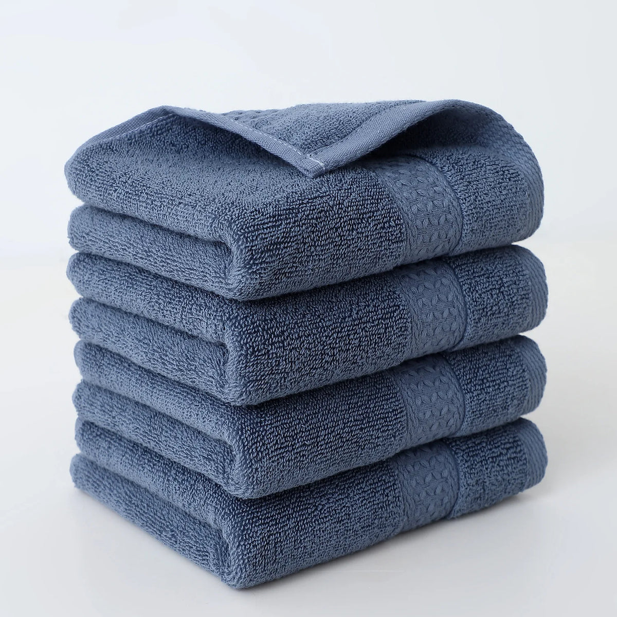 Set of four FanzyMarket cotton face towels, 30x30 cm, soft and absorbent for face, bath, and household use.
