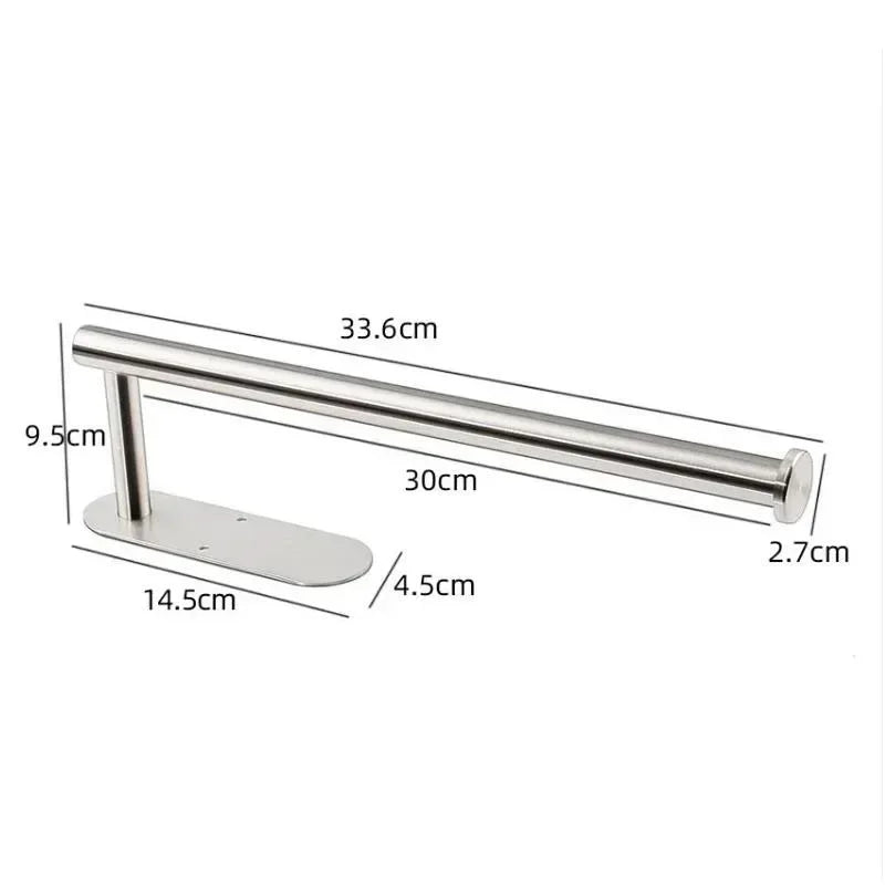 FanzyMarket matte black stainless steel self-adhesive toilet paper holder mounted on bathroom wall, no drill required.