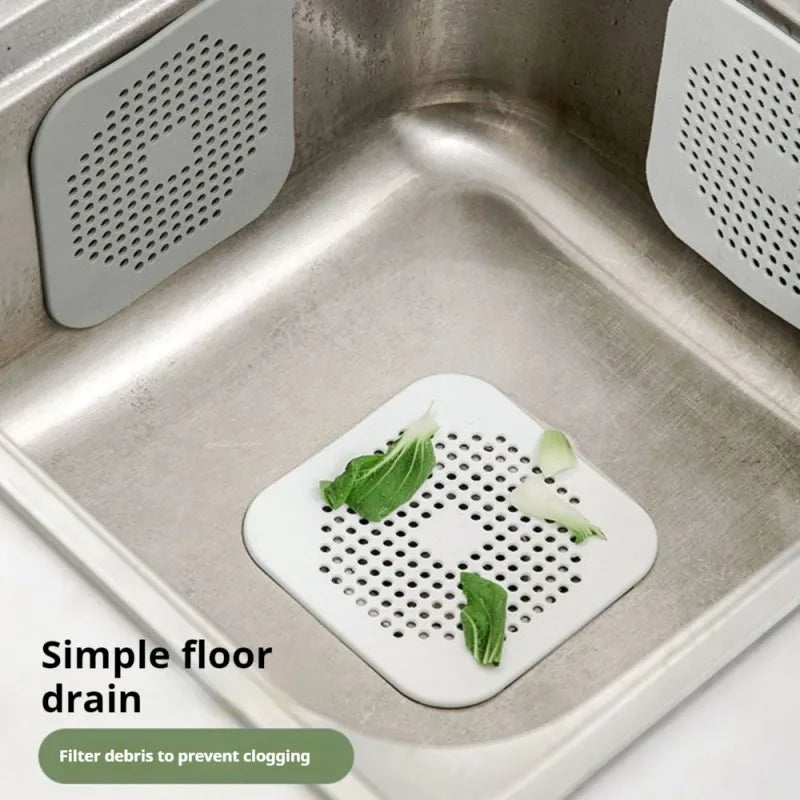 Gray 5.5-inch suction cup hair drain strainer from FanzyMarket, designed to catch hair and prevent clogs in kitchen and bathroom drains.