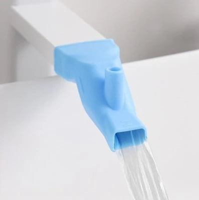 Green silicone faucet extender from FanzyMarket, universal sink spout extender for kids, bathroom, and kitchen plumbing.