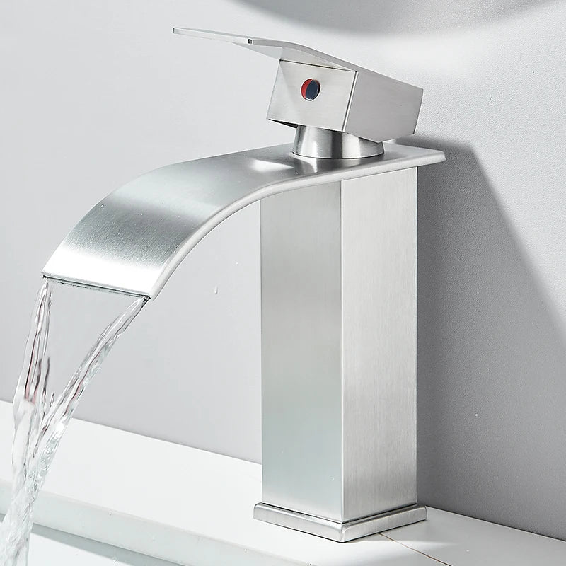 Matte black waterfall basin faucet by FanzyMarket, deck-mounted single-handle mixer tap for bathroom sink with hot and cold water.