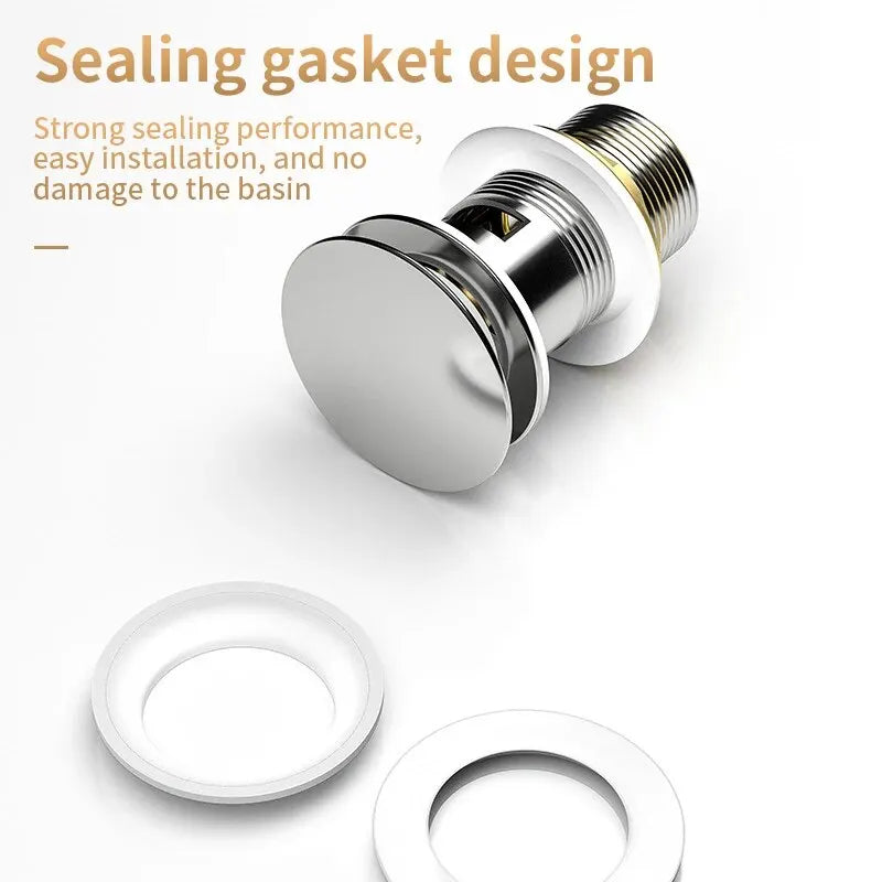Stainless steel chrome spring-loaded push-down bathroom sink drain with mushroom-head stopper, designed for easy operation.
