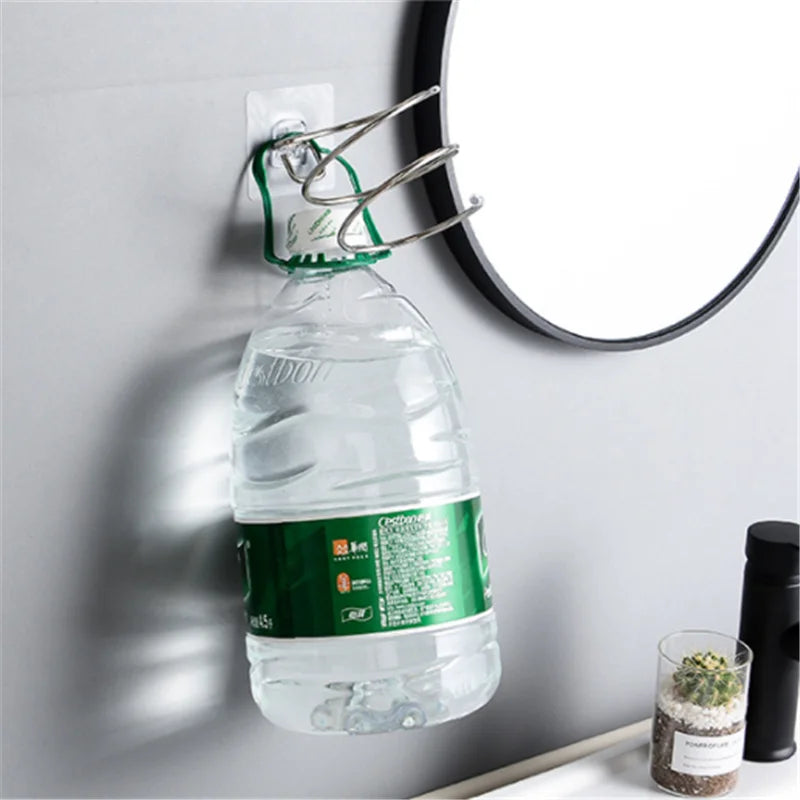 Yellow stainless steel wall-mounted hair dryer holder with spiral stand and nail-free adhesive, 12 x 10 cm, for bathroom organization.