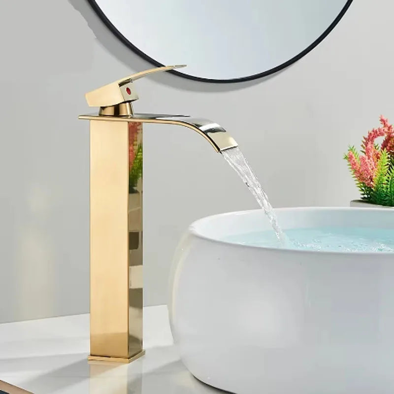 Brushed gold waterfall bathroom faucet by FanzyMarket, single lever deck-mount basin mixer with ceramic valve and single-hole design.