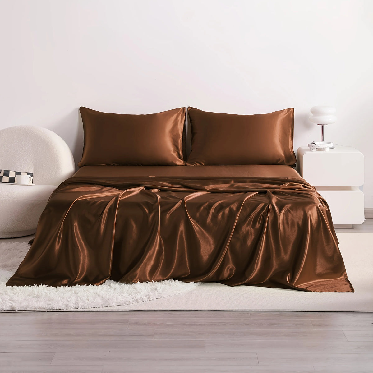 FanzyMarket 4-piece cooling satin bed sheet set with breathable hypoallergenic 500TC flat sheet, fitted sheet, and pillowcases.