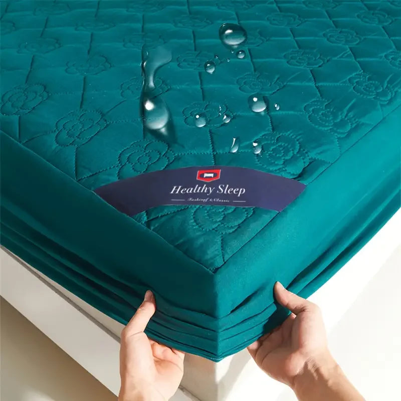Dark green waterproof fitted mattress protector by FanzyMarket, breathable soft cover for single or double beds, deep-pocket design.