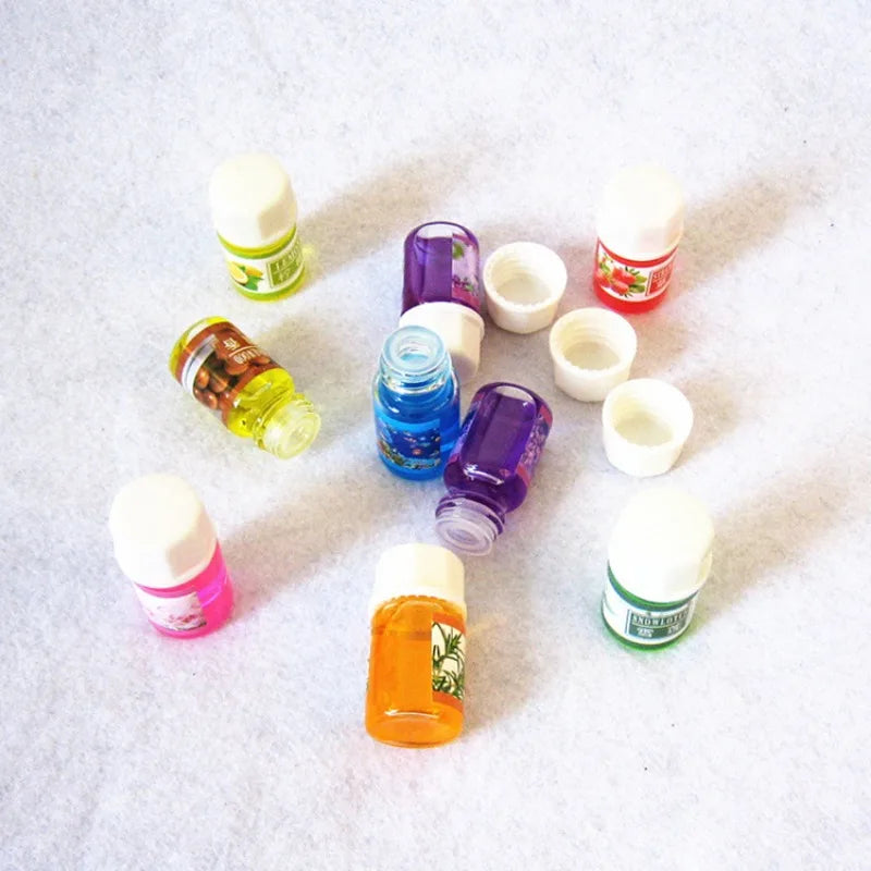 FanzyMarket 12-pack of 3ml water-soluble aromatherapy essential oils for diffusers and humidifiers, with mixed scents.