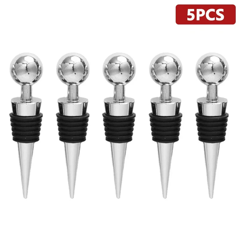 Set of 12 reusable plastic wine bottle stoppers with vacuum twist mechanism, leakproof champagne stoppers for kitchen and bar use.