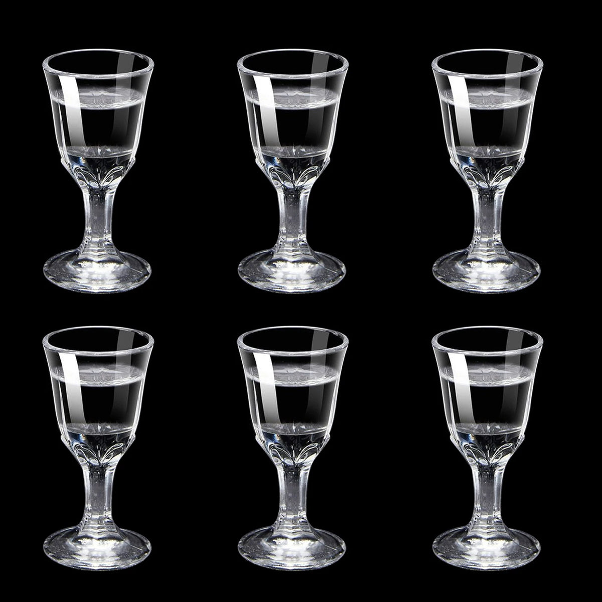 Six clear mini stemmed shot glasses in assorted sizes 10, 15, and 25 ml, ideal for liquor, sake, and party servings.