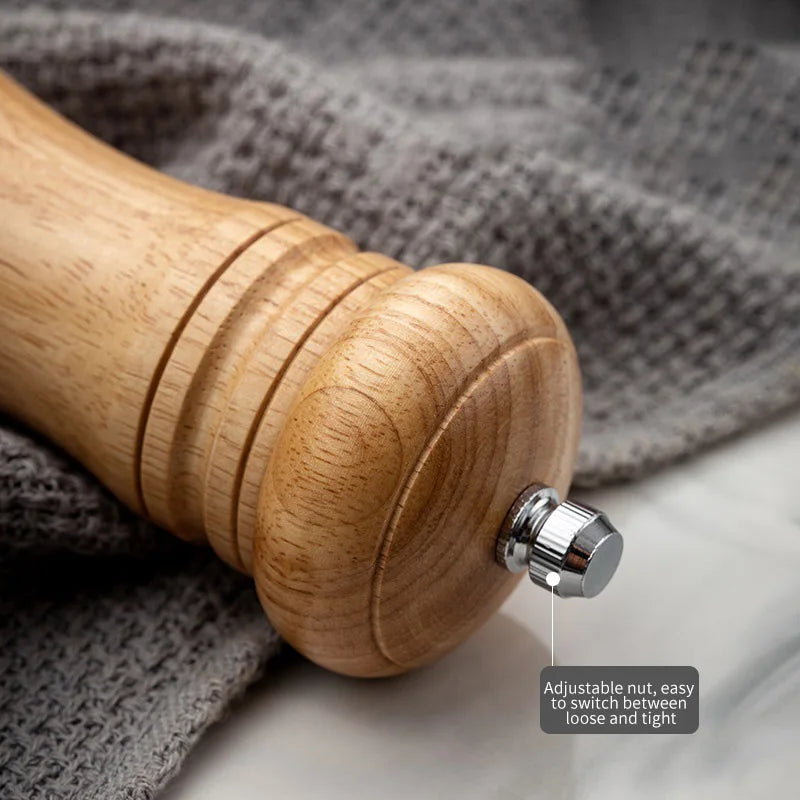 FanzyMarket manual pepper mill with acrylic and rubber wood design, ceramic core for freshly ground black pepper.
