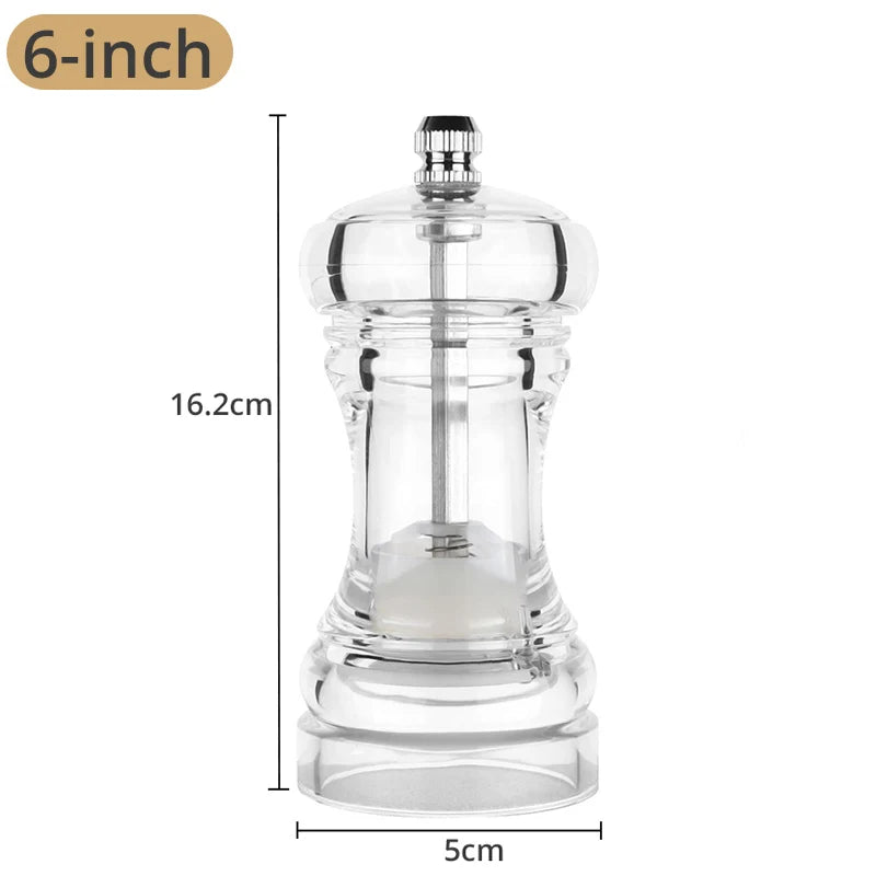 Acrylic pepper grinder with ceramic rotor and adjustable coarseness for salt and pepper, by FanzyMarket, in a kitchen setting.
