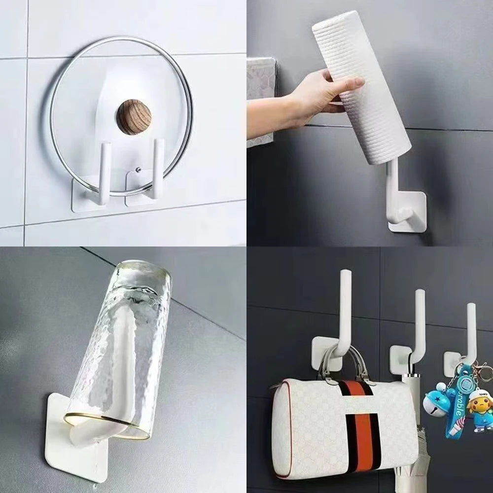 FanzyMarket 2-pack no-drill under-cabinet paper towel holders and multi-purpose hooks for wall or over-door kitchen organization.