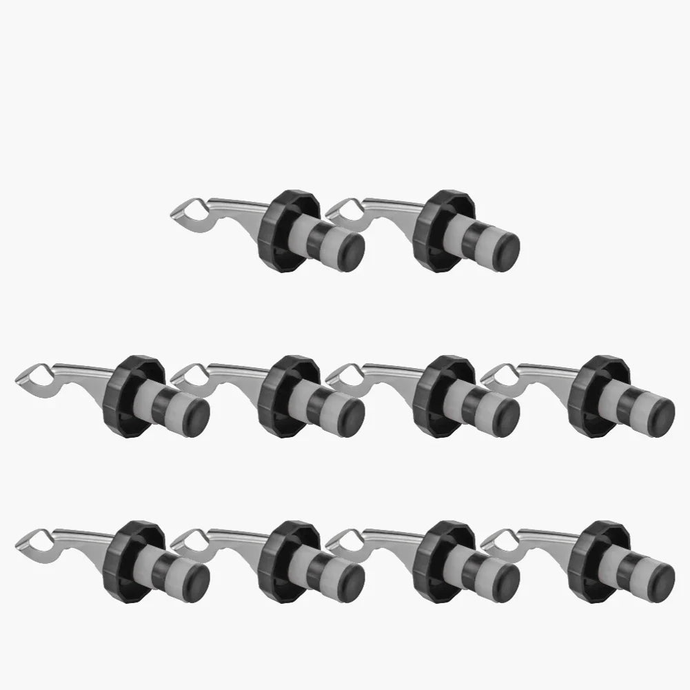 Set of five black and red stainless steel and silicone press vacuum wine bottle stoppers for sealing wine and champagne bottles.