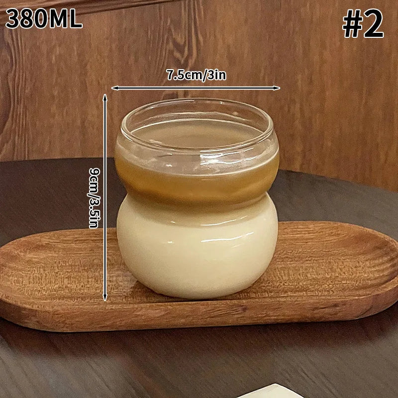 Clear tall glass coffee mug by FanzyMarket, 500ml, ideal for iced coffee, milk, juice, or cocktails, with a sleek, transparent design.