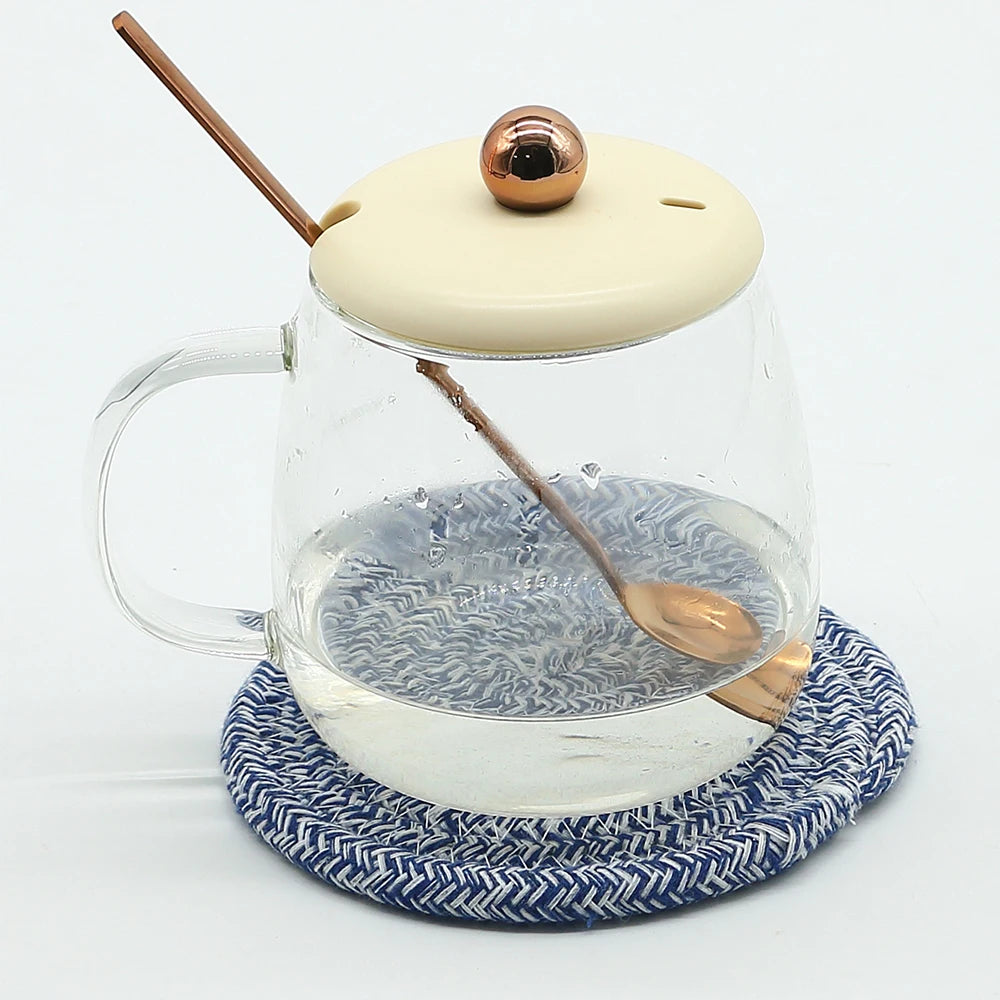 FanzyMarket woven cotton-linen drink coaster, heat-resistant and absorbent cup mat for protecting tables in kitchen and dining areas.