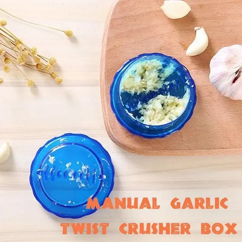 Blue FanzyMarket manual garlic press and chopper, compact kitchen gadget for crushing and chopping garlic easily.