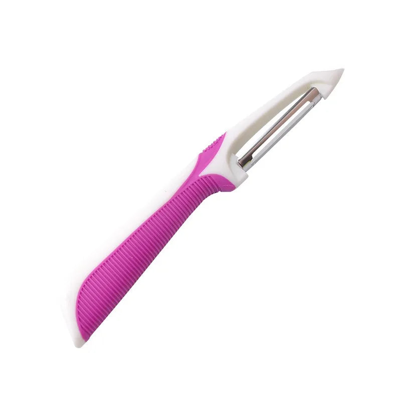 FanzyMarket multifunctional stainless steel potato peeler and vegetable knife for kitchen, showing the white and purple peeling tool in use.
