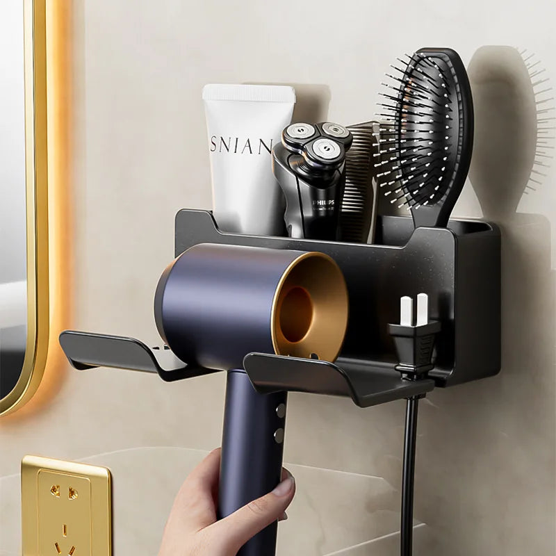 Gray wall-mounted hair dryer holder cradle, organized for bathroom storage, part of FanzyMarket’s home and garden organization collection.