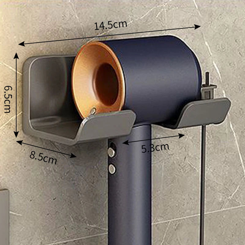 Gray wall-mounted hair dryer holder cradle by FanzyMarket, designed for bathroom organization and easy blow dryer storage.