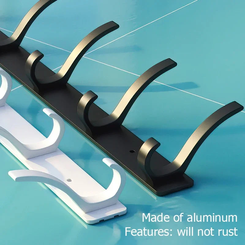 FanzyMarket 6-Peg Folding Wall Hooks in black and white, aluminum nail-mount towel and coat rack on cream-white background.