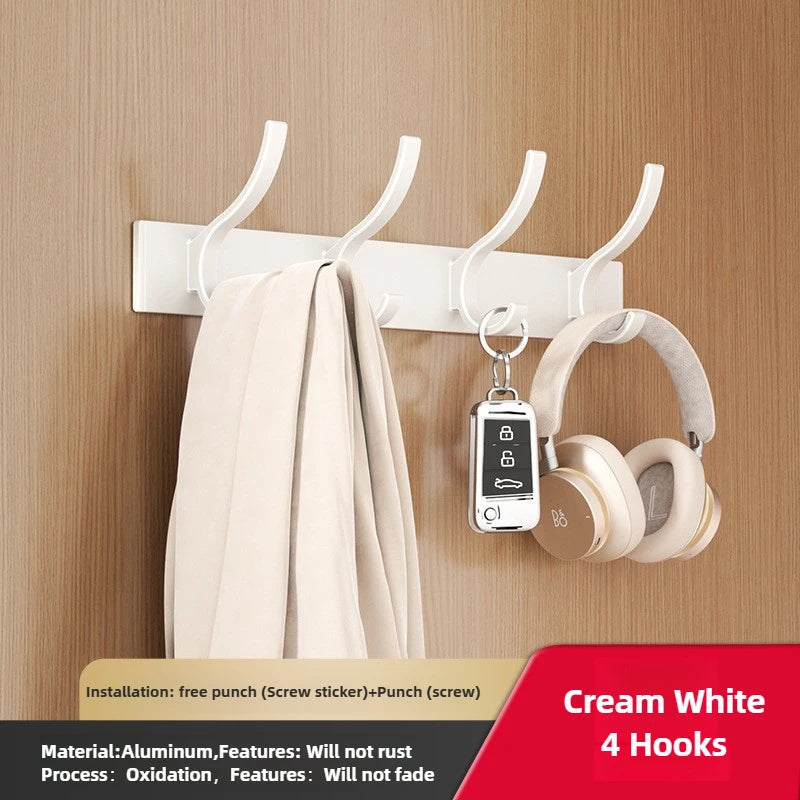 FanzyMarket 6-peg folding wall hooks in black and white, aluminum nail-mount towel and coat rack on a cream-white wall.