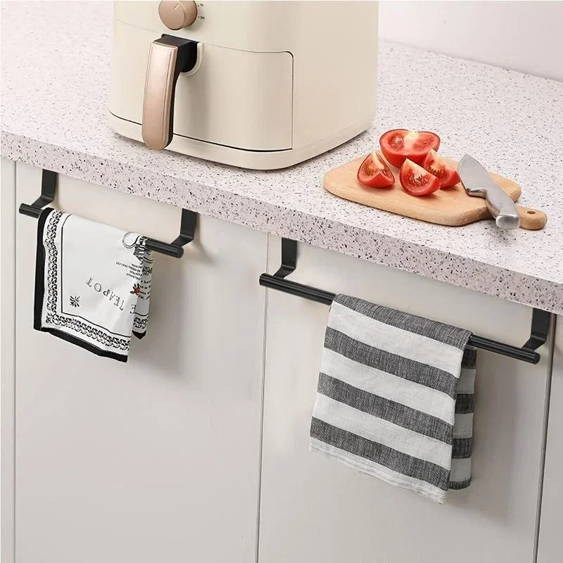 Stainless steel over-cabinet towel bar by FanzyMarket, no-drill over-door towel rack for kitchen and bathroom storage.