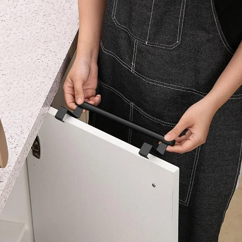 Stainless steel over-cabinet towel bar by FanzyMarket, no-drill over-door towel rack for kitchen and bathroom storage.