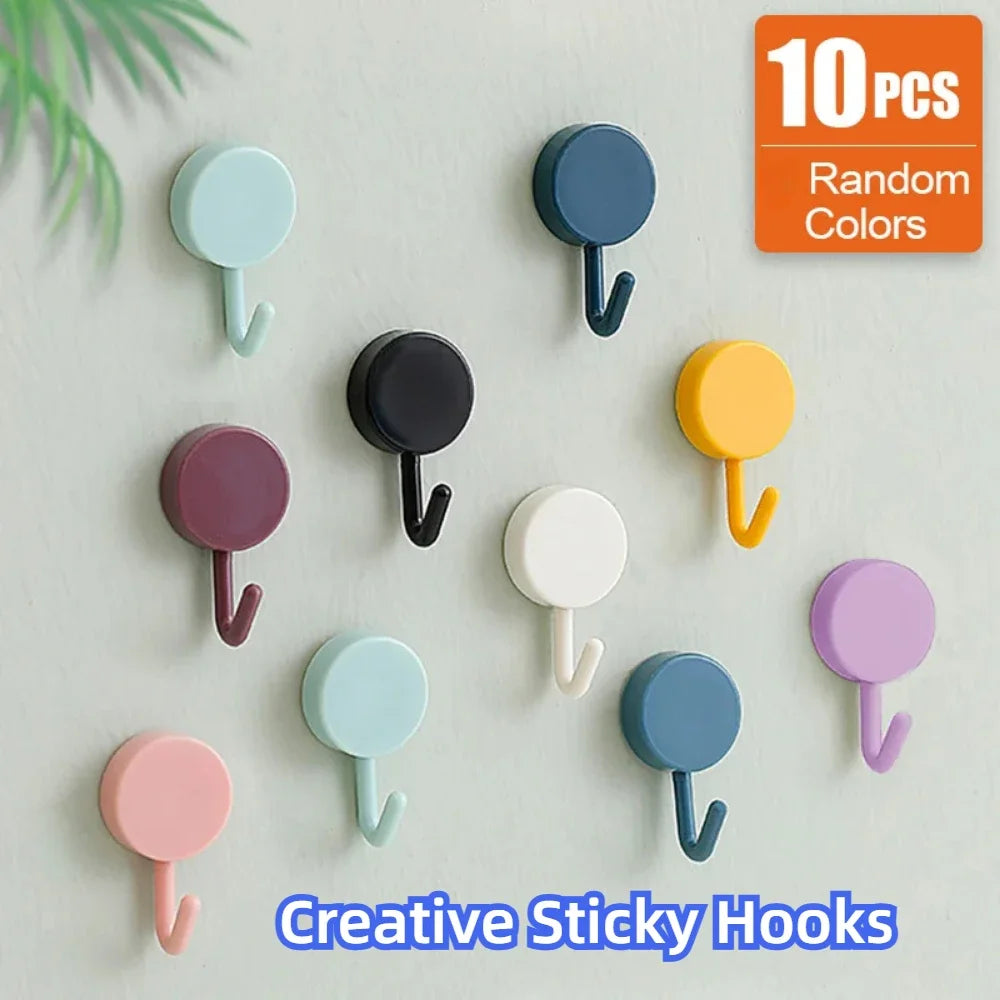 FanzyMarket 10-pack self-adhesive wall hooks for bathroom and kitchen, plastic coat towel hangers, no-drill installation, colorful design.