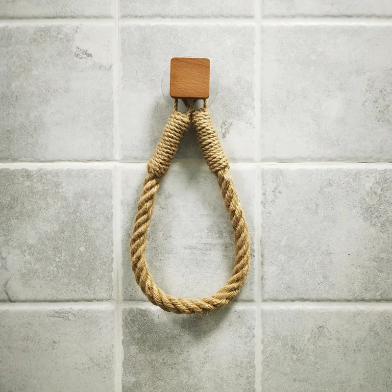 FanzyMarket nail-free wall-mounted rope paper towel and toilet roll holder, designed for easy organization and clutter-free storage.