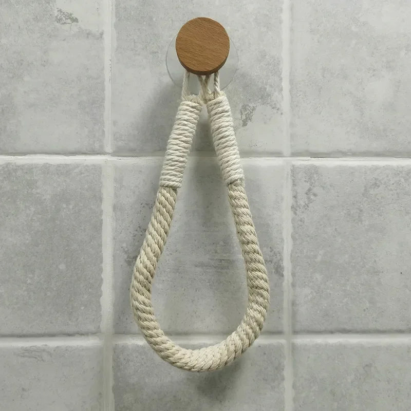 FanzyMarket nail-free wall-mounted rope paper towel and toilet roll holder, featuring a minimalist design and tissue hook.
