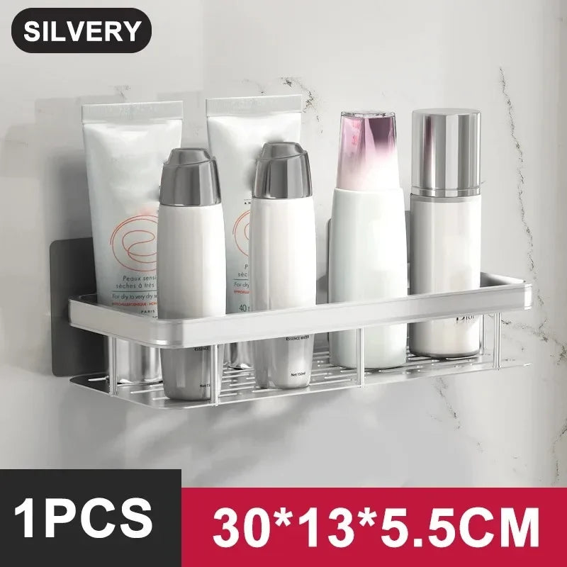 FanzyMarket no-drill aluminum alloy bathroom shower shelf and kitchen organizer wall-mounted shampoo rack in black and gold.