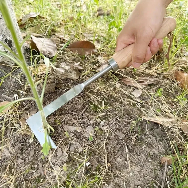 FanzyMarket L-shaped handheld garden weeder puller used for removing weeds from bonsai and garden plants.