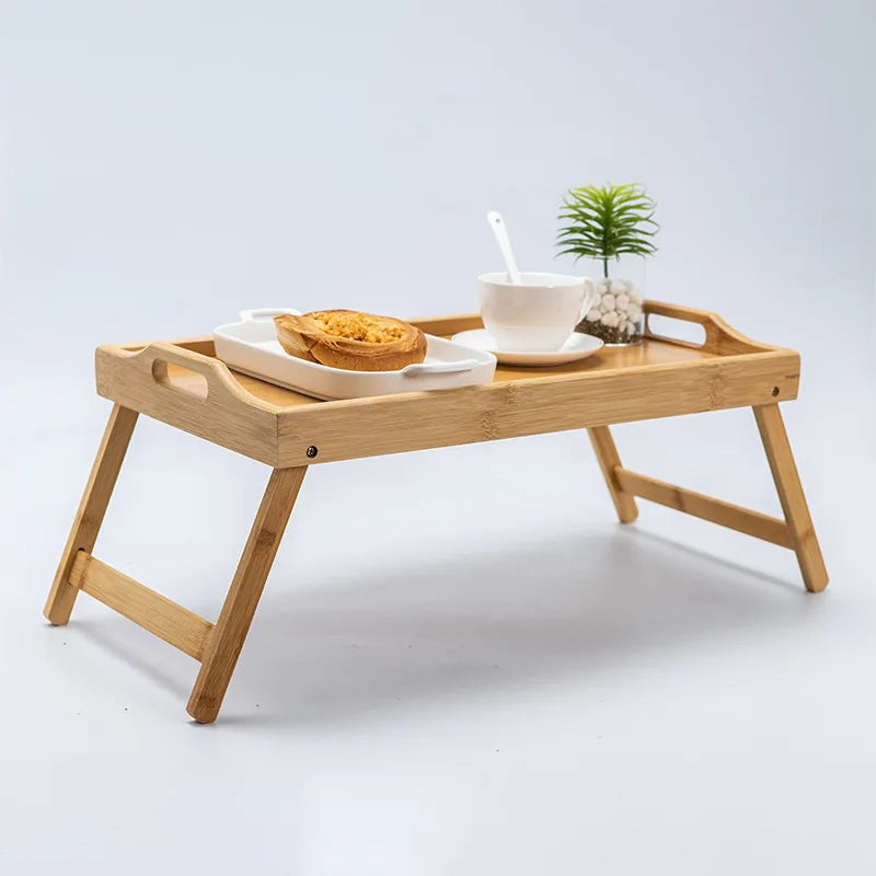 FanzyMarket bamboo lap desk with folding legs, portable bed tray and laptop stand, measuring 50 x 30 cm, ideal for office and tech use.