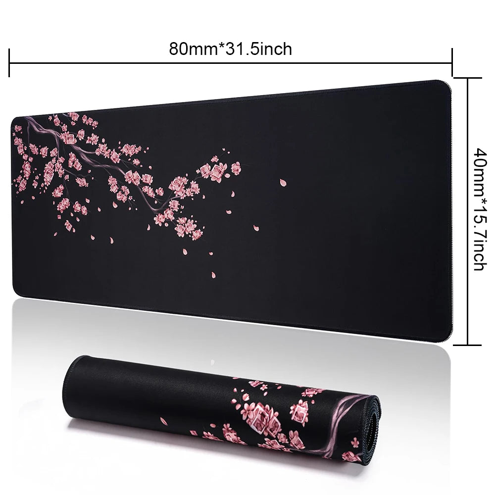 Extended large FanzyMarket gaming mouse pad with stitched edges and non-slip rubber base, measuring 60x30 to 90x40 cm.