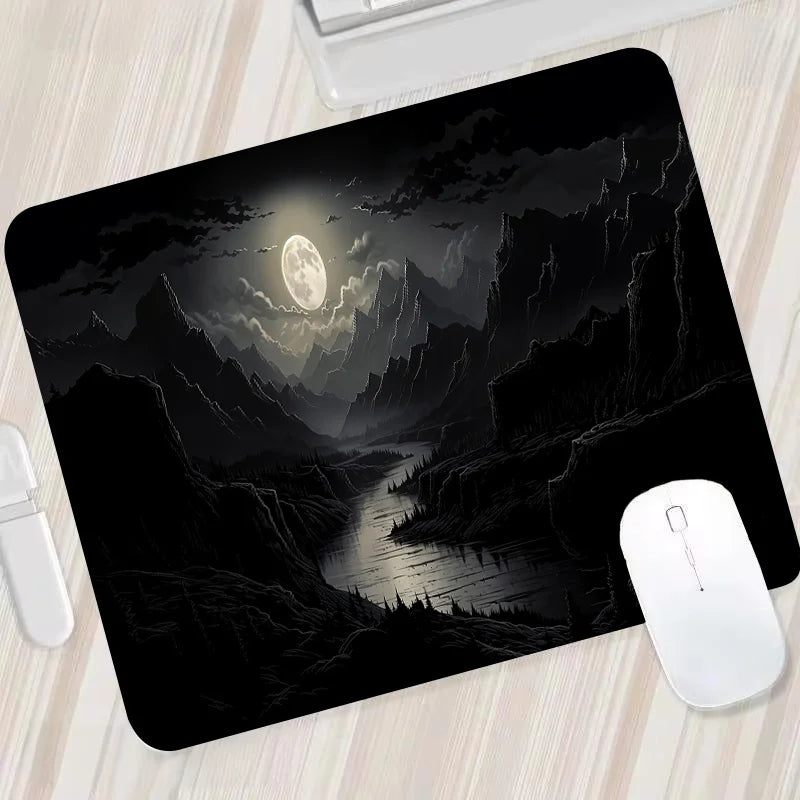 FanzyMarket large gaming mouse pad featuring night moonlight design, non-slip rubber base, stitched edges for laptop and PC use.