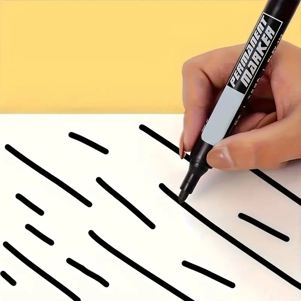 Bulk 50-pack of FanzyMarket waterproof oil-based permanent markers in black, blue, and red for metal, glass, and paper writing.