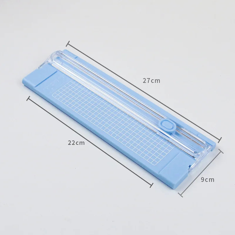 FanzyMarket pink mini portable A4 paper trimmer for office and DIY, featuring a manual plastic photo and craft cutting tool.