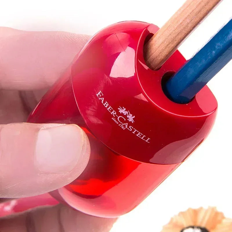 FanzyMarket transparent pencil sharpener with double and single holes, ideal for school stationery and kids' writing supplies.