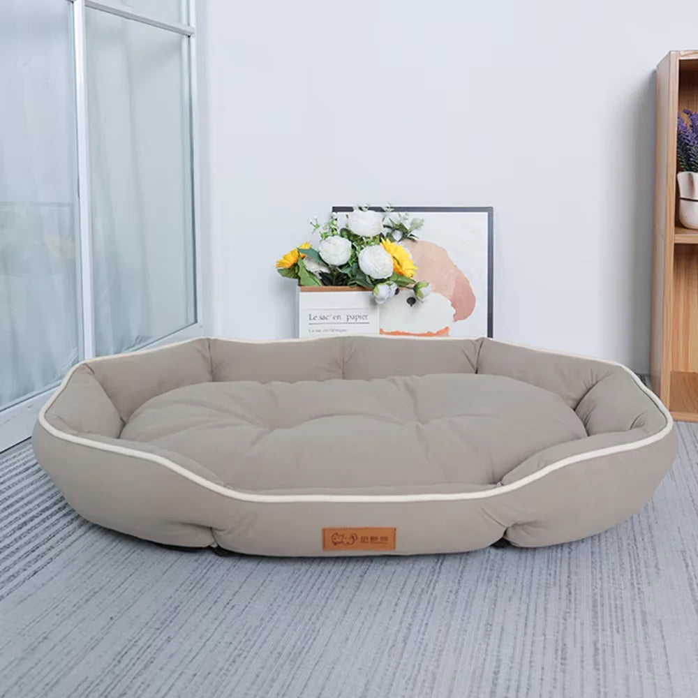 Large plush green pet sofa bed by FanzyMarket with corduroy fabric, perfect for dogs and cats to rest comfortably during winter.