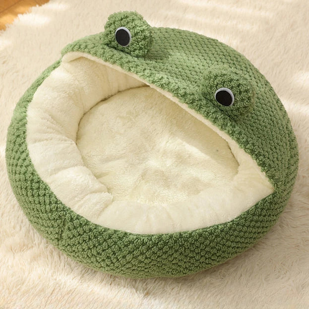 Frog-shaped semi-enclosed plush pet bed by FanzyMarket for small cats and dogs, cozy warm nest for kittens and puppies.