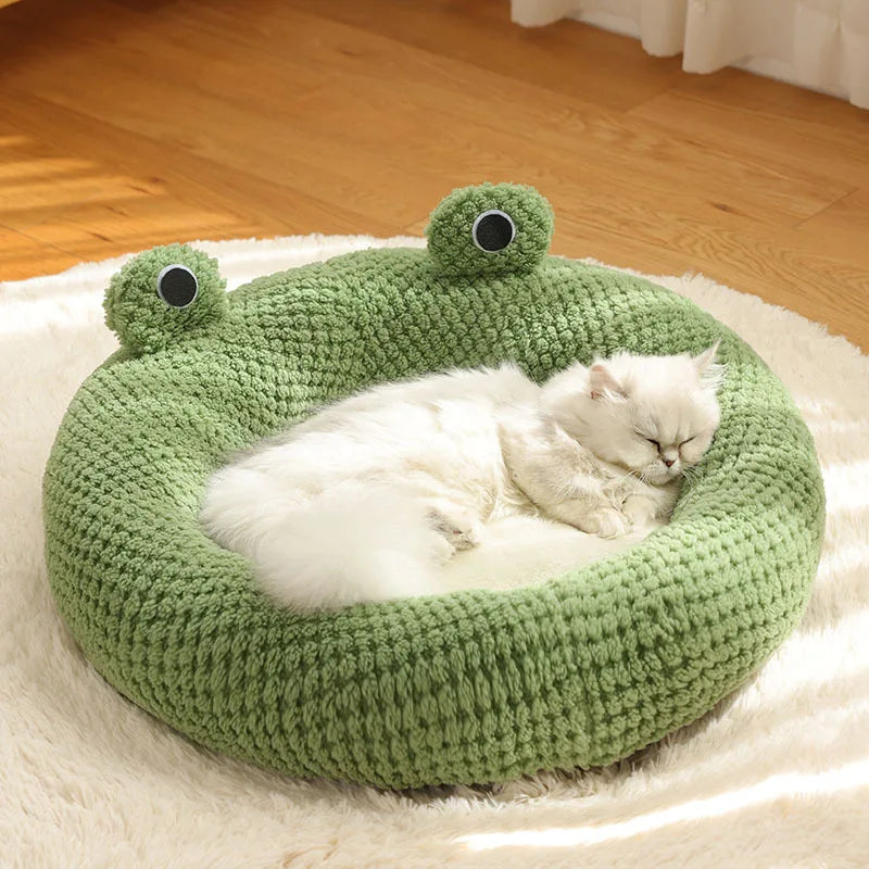 FanzyMarket frog-shaped plush pet bed, semi-enclosed and cozy for cats and small dogs, providing warm, comfortable nesting space.