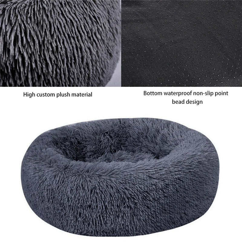 Pink orthopedic donut pet bed by FanzyMarket, soft plush round sofa for dogs and cats, washable, calming, anti-anxiety design.
