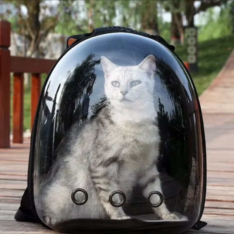 Black portable space capsule cat backpack carrier with breathable, ventilated design for comfortable pet travel by FanzyMarket.