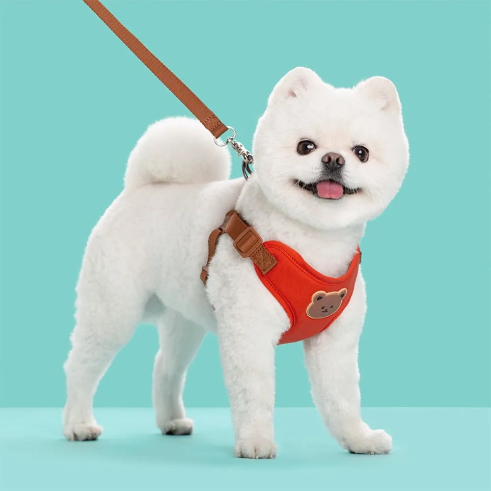 Green adjustable no-pull pet harness and leash with anti-escape chest strap for small and medium dogs and cats by FanzyMarket.