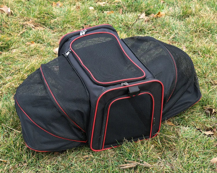 FanzyMarket foldable mesh pet carrier for cats and small dogs, soft-sided, expandable, breathable handheld travel tote.
