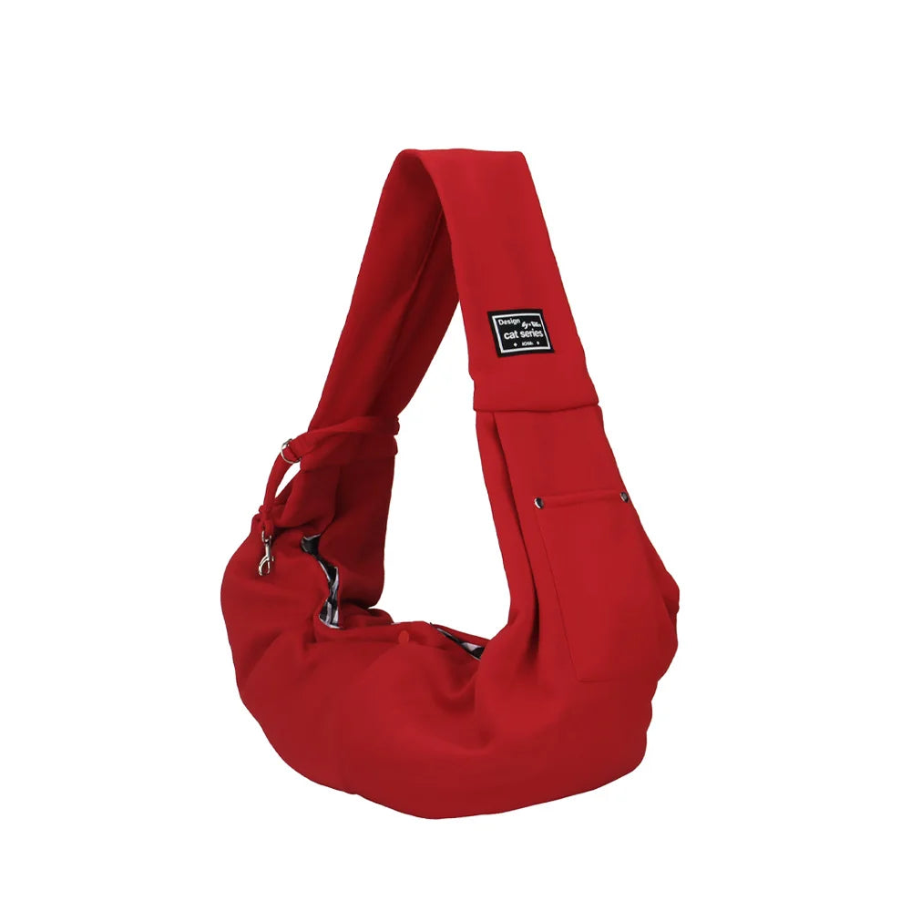 FanzyMarket portable pet shoulder carrier with phone pocket, ideal for small dogs and cats, in orange-brown travel handbag style.
